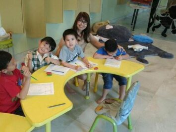 Children engaged in a phonics lesson, exploring the relationship between sounds and letters to boost reading skills. Children engaged in a phonics lesson, exploring the relationship between sounds and letters to boost reading skills.