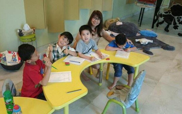 Children engaged in a phonics lesson, exploring the relationship between sounds and letters to boost reading skills. Children engaged in a phonics lesson, exploring the relationship between sounds and letters to boost reading skills.